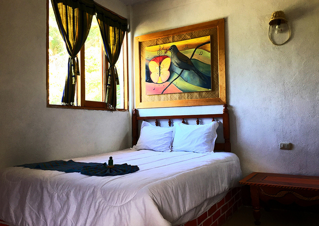 A guest room at Uxlabil Atitlan Eco Hotel